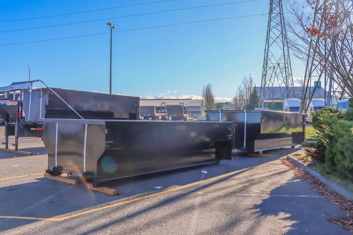 Roll-off dumpster ready for waste disposal at job site for Concrete Dumpster Rental in White Plains